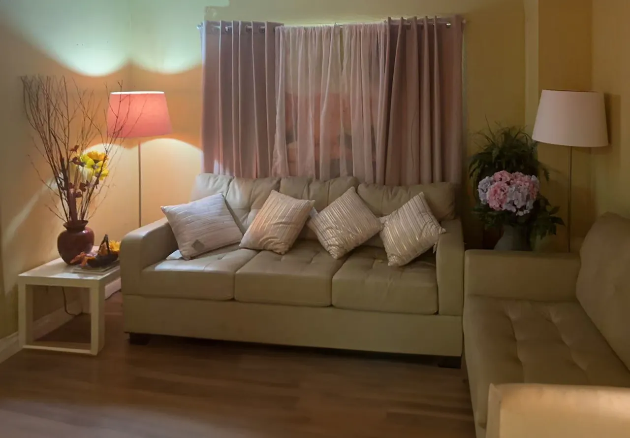 Lounge with a cream sofa inside Blue Sky Massage in Upland, CA